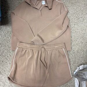 All in Motion Beige tennis set.  Size large